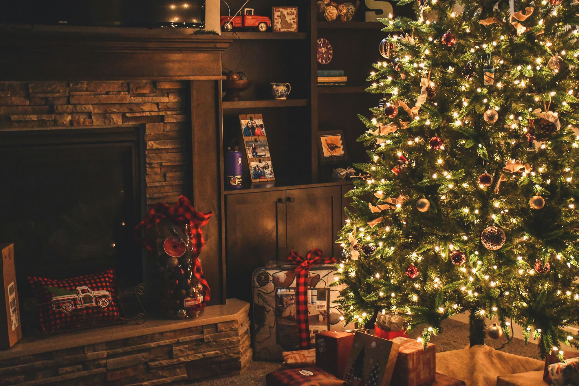 Traditional Christmas tree and fireplace